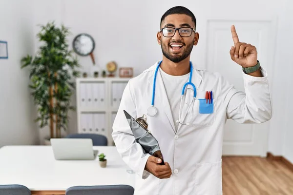 Young Indian Man Wearing Doctor Uniform Stethoscope Smiling Amazed Surprised — Stock Photo, Image