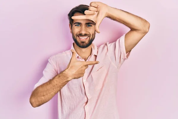 Young Hispanic Man Wearing Casual Clothes Smiling Making Frame Hands — Stock Photo, Image