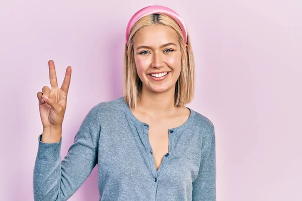 Beautiful Blonde Woman Standing Pink Background Showing Pointing Fingers Number — 스톡 사진