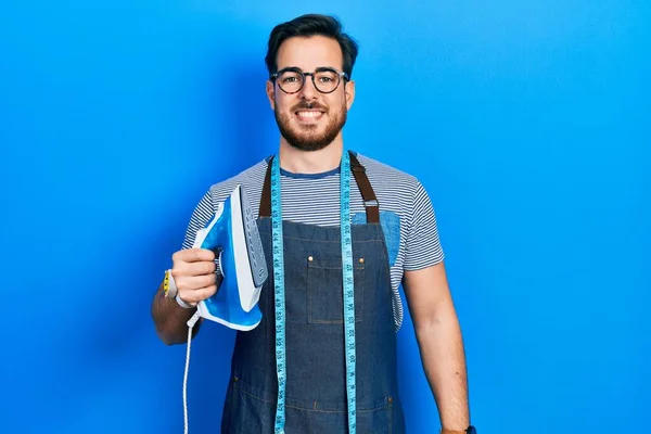 Handsome Caucasian Man Beard Dressmaker Designer Wearing Atelier Apron Holding — Stock Photo, Image