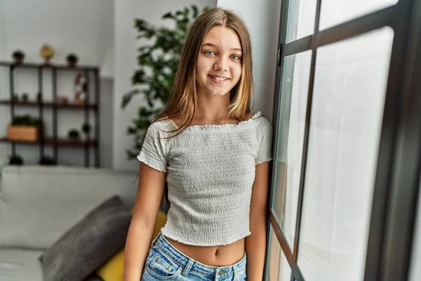 Menina Adorável Sorrindo Confiante Inclinado Janela Casa — Fotografia de Stock