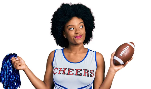 Young African American Woman Wearing Cheerleader Uniform Holding Pompom Football — Zdjęcie stockowe