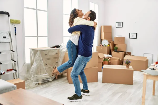 Middle Age Hispanic Couple Smiling Happy Hugging New Home — Stock Photo, Image