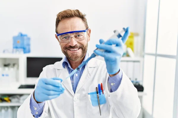 Middle Age Hispanic Man Wearing Scientist Uniform Working Laboratory — Stock Photo, Image