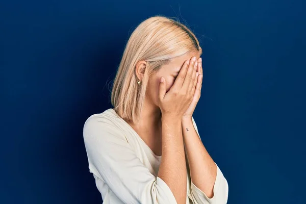 Beautiful Blonde Woman Wearing Casual Sweater Sad Expression Covering Face — ストック写真