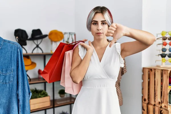 Young Beautiful Woman Holding Shopping Bags Retail Shop Angry Face — Stock Photo, Image