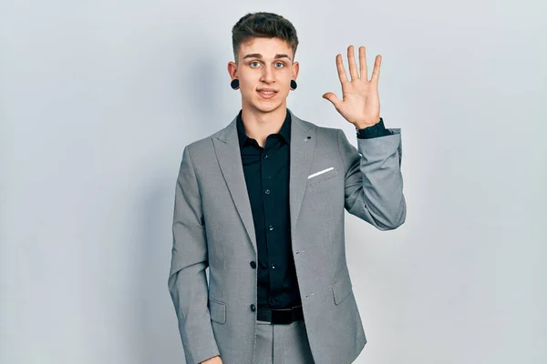 Young Caucasian Boy Ears Dilation Wearing Business Jacket Showing Pointing — Stock Photo, Image