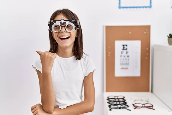 Young Hispanic Girl Wearing Optometry Glasses Smiling Happy Face Looking — Stock Photo, Image