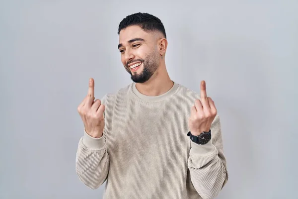 Young Handsome Man Standing Isolated Background Showing Middle Finger Doing — Φωτογραφία Αρχείου