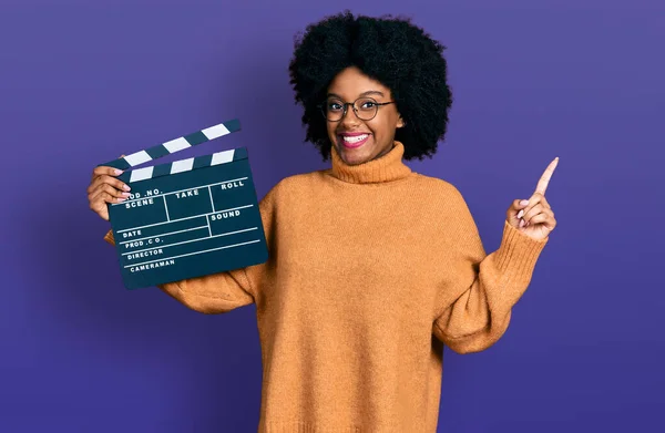 Young African American Woman Holding Video Film Clapboard Smiling Happy — Stok fotoğraf