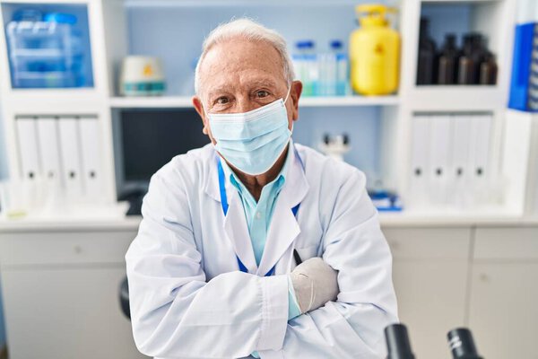 Senior Man Wearing Scientist Uniform Medical Mask Arms Crossed Gesture Stock Picture