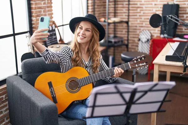 Young Blonde Woman Musician Making Selfie Smartphone Holding Classical Guitar — Stock Photo, Image