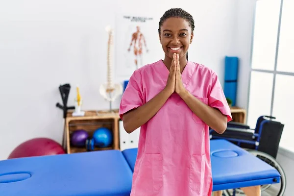 Young African American Woman Working Pain Recovery Clinic Praying Hands — 스톡 사진