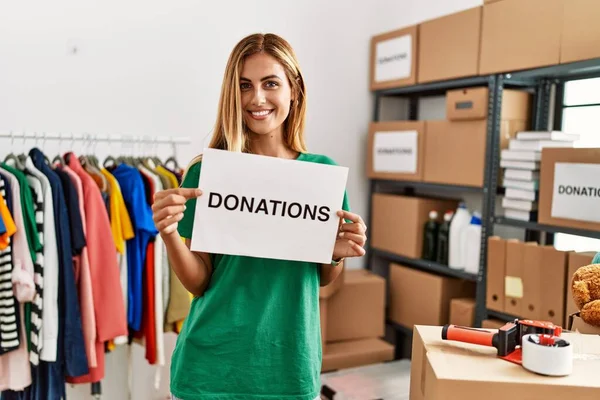 Young Caucasian Volunteer Girl Smiling Happy Holding Donations Banner Charity — Stock Photo, Image