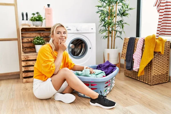 Young Caucasian Woman Putting Dirty Laundry Washing Machine Looking Confident — Fotografia de Stock