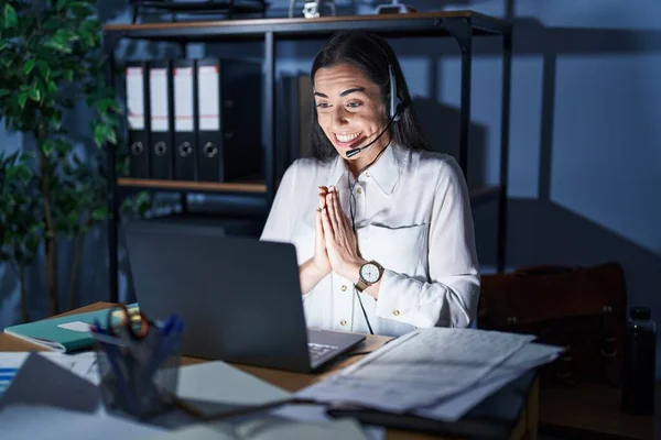 Young Brunette Woman Wearing Call Center Agent Headset Working Late — Stockfoto