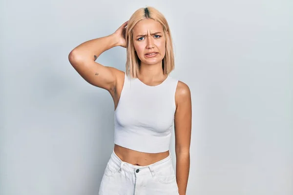 Beautiful Blonde Woman Wearing Casual Style Sleeveless Shirt Confuse Wonder — ストック写真