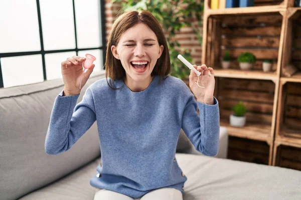 Young Brunette Woman Holding Menstrual Cup Tampon Smiling Laughing Hard — Foto Stock