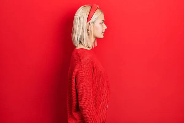 Beautiful Blonde Woman Wearing Casual Red Sweater Looking Side Relax — Stock Fotó