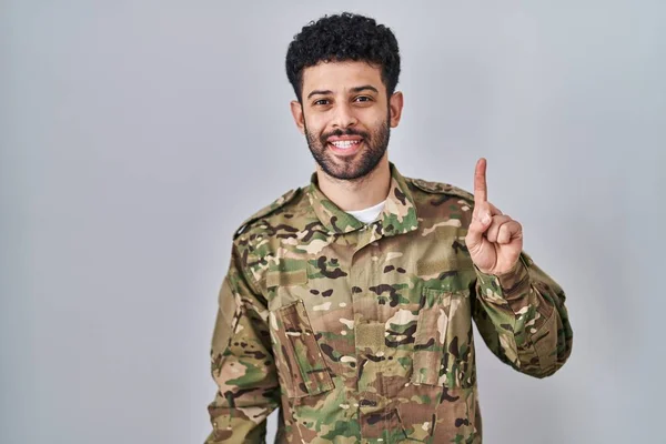 Arab Man Wearing Camouflage Army Uniform Showing Pointing Finger Number — Stock Photo, Image