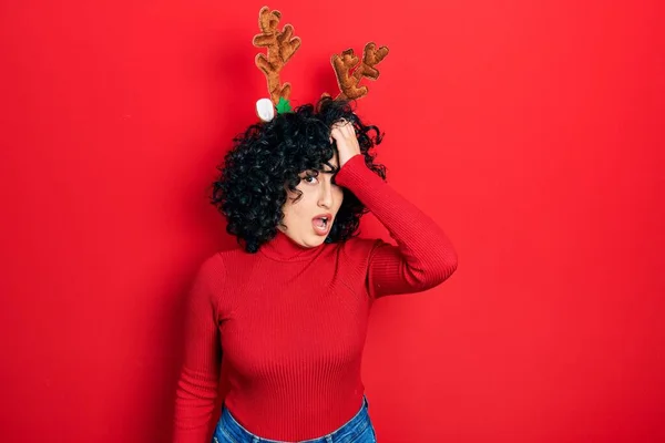 Young Middle East Woman Wearing Cute Christmas Reindeer Horns Surprised — Photo