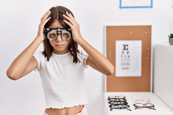 Young Hispanic Girl Wearing Optometry Glasses Suffering Headache Desperate Stressed — Stock Photo, Image