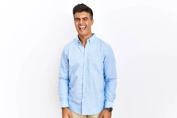 Young Hispanic Man Wearing Business Shirt Standing Isolated Background Winking — Foto de Stock