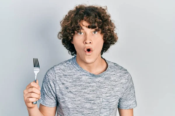 Handsome Young Man Holding One Silver Fork Scared Amazed Open — Stock Photo, Image