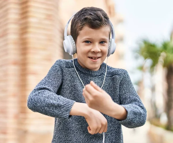 Blond Child Smiling Confident Listening Music Dancing Street — стоковое фото