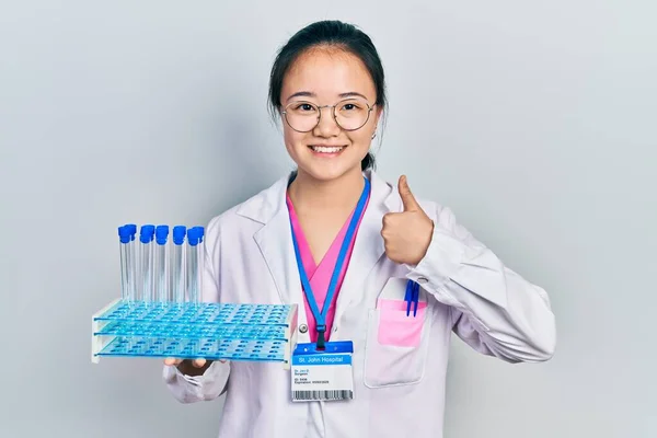 Young Chinese Girl Wearing Scientist Uniform Holding Test Tube Smiling — Stock Photo, Image