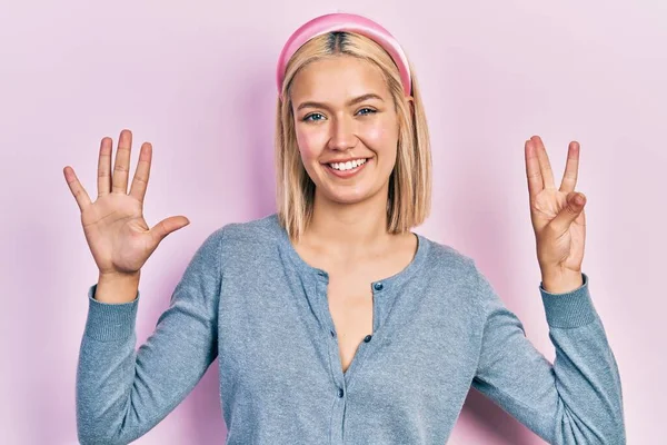 Beautiful Blonde Woman Standing Pink Background Showing Pointing Fingers Number — ストック写真