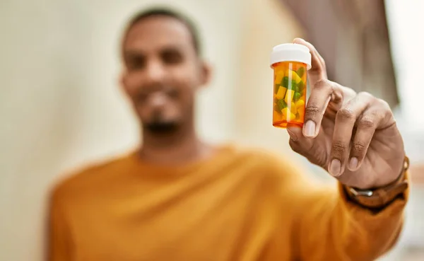 Young African American Man Smiling Happy Holding Pills City — Stock Photo, Image