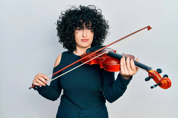 Young Middle East Woman Playing Violin Skeptic Nervous Frowning Upset — Stock Photo, Image