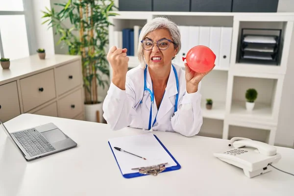 Middle Age Woman Grey Hair Wearing Doctor Uniform Holding Balloon — Stock Photo, Image