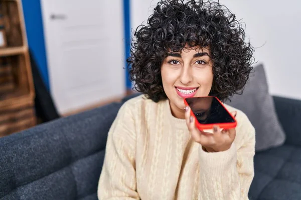 Young Middle East Woman Talking Smartphone Sitting Sofa Home — Stockfoto