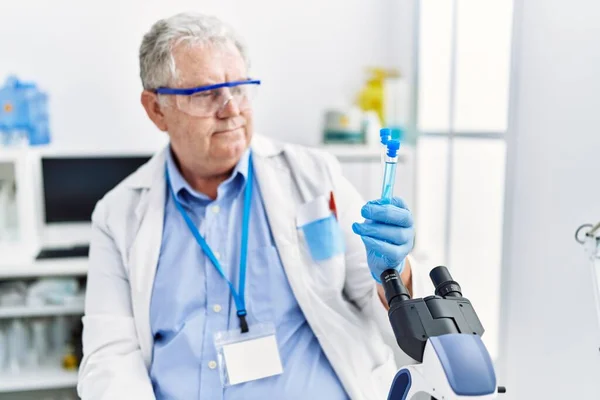 Middle Age Grey Haired Man Wearing Scientist Uniform Holding Test — Fotografia de Stock