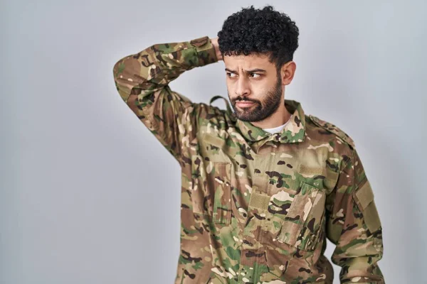 Arab Man Wearing Camouflage Army Uniform Confuse Wondering Question Uncertain — Stock Photo, Image