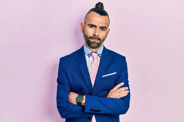 Young Hispanic Man Wearing Business Suit Arms Crossed Gesture Skeptic — Stockfoto