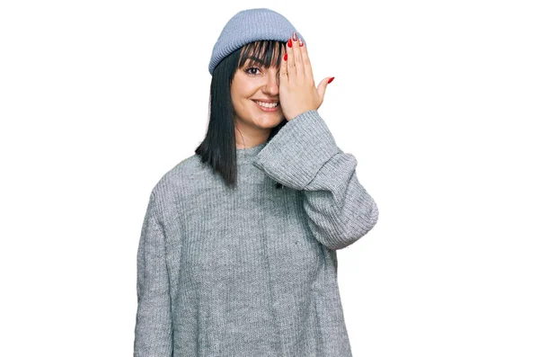 Young Hispanic Woman Wearing Cute Wool Cap Covering One Eye — Stockfoto