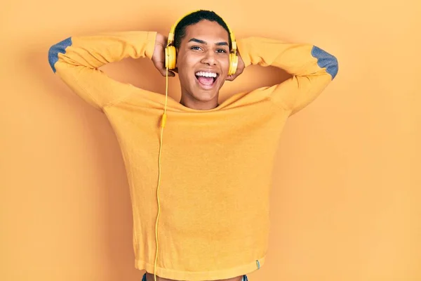 Young African American Guy Listening Music Using Headphones Relaxing Stretching — 图库照片
