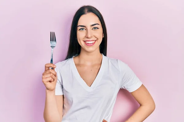 Beautiful Woman Blue Eyes Holding One Silver Fork Looking Positive — 图库照片