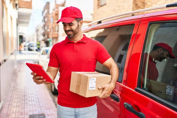 Young Hispanic Man Courier Using Touchpad Holding Package Street — Stock Photo, Image