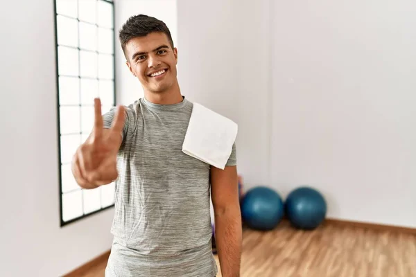 Young Hispanic Man Wearing Sportswear Towel Gym Showing Pointing Fingers — Fotografia de Stock