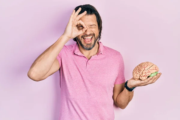 Middle Age Caucasian Man Holding Brain Smiling Happy Doing Sign — Stock Photo, Image