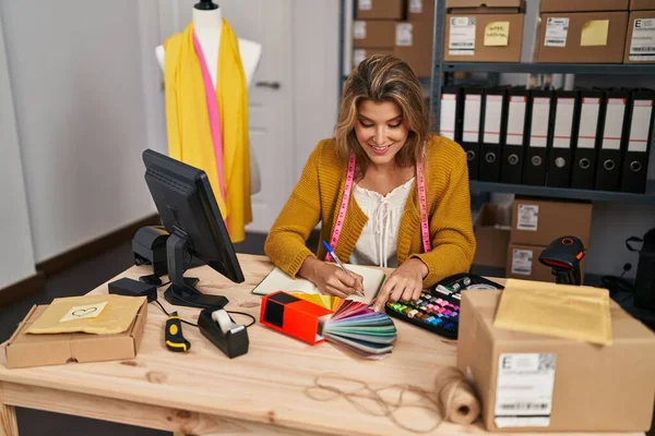 Young Blonde Woman Dressmaker Choosing Cloth Color Designer Studio — Foto de Stock