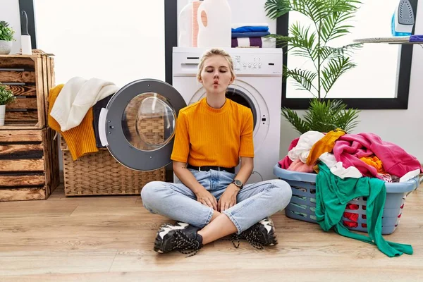 Young Blonde Woman Doing Laundry Sitting Washing Machine Making Fish — Stockfoto