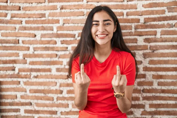 Young Teenager Girl Standing Bricks Wall Showing Middle Finger Doing — Stok fotoğraf