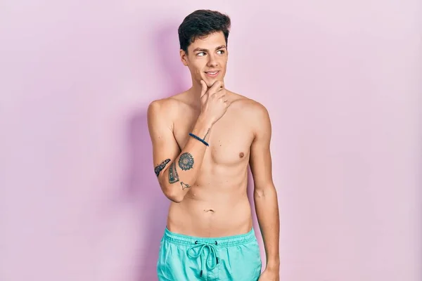 Young Hispanic Man Wearing Swimwear Shirtless Hand Chin Thinking Question — Stock Photo, Image