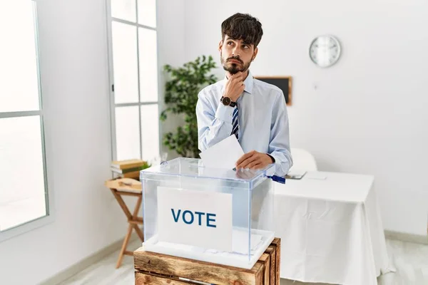 Hispanic Man Beard Voting Putting Envelop Ballot Box Hand Chin — Stock Photo, Image