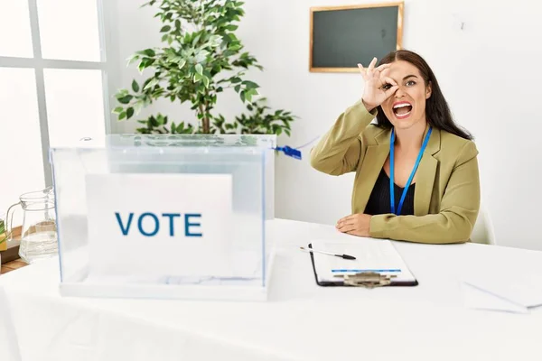 Young Brunette Woman Sitting Election Table Voting Ballot Doing Gesture — Stock Photo, Image